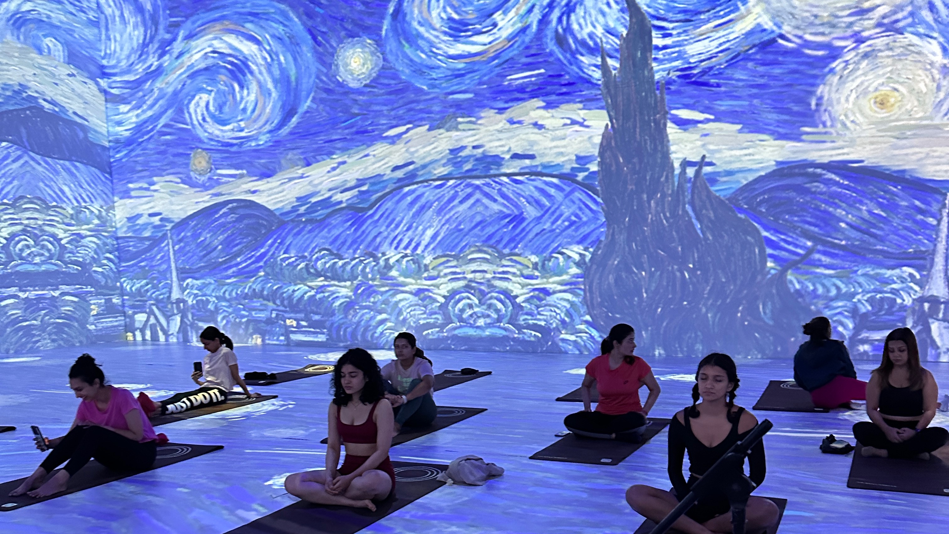 Yoga + sound bowl experience at the Van Gogh Immersive exhibition - Image 3